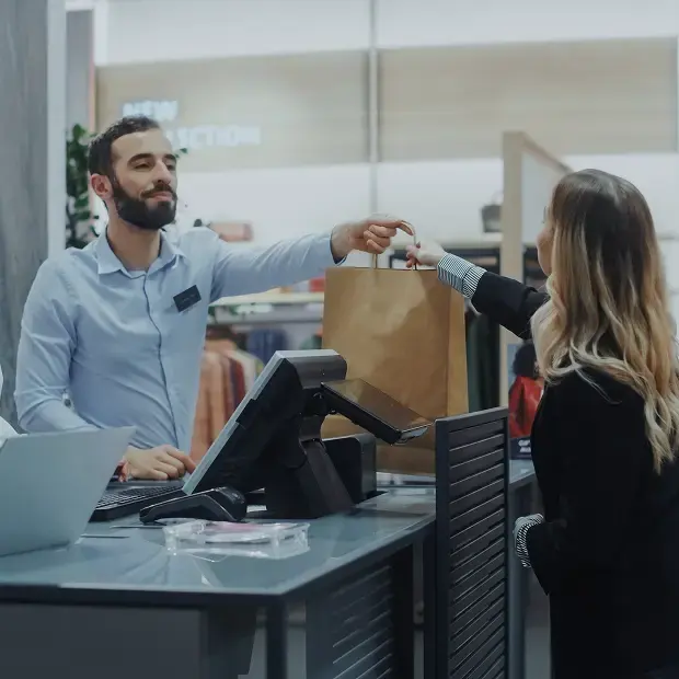 person-paying-at-till